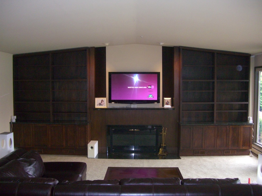 This is an example of a contemporary home cinema in Seattle.