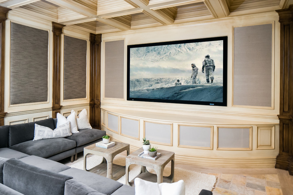 Inspiration for a mediterranean enclosed home cinema in Orange County with a projector screen.
