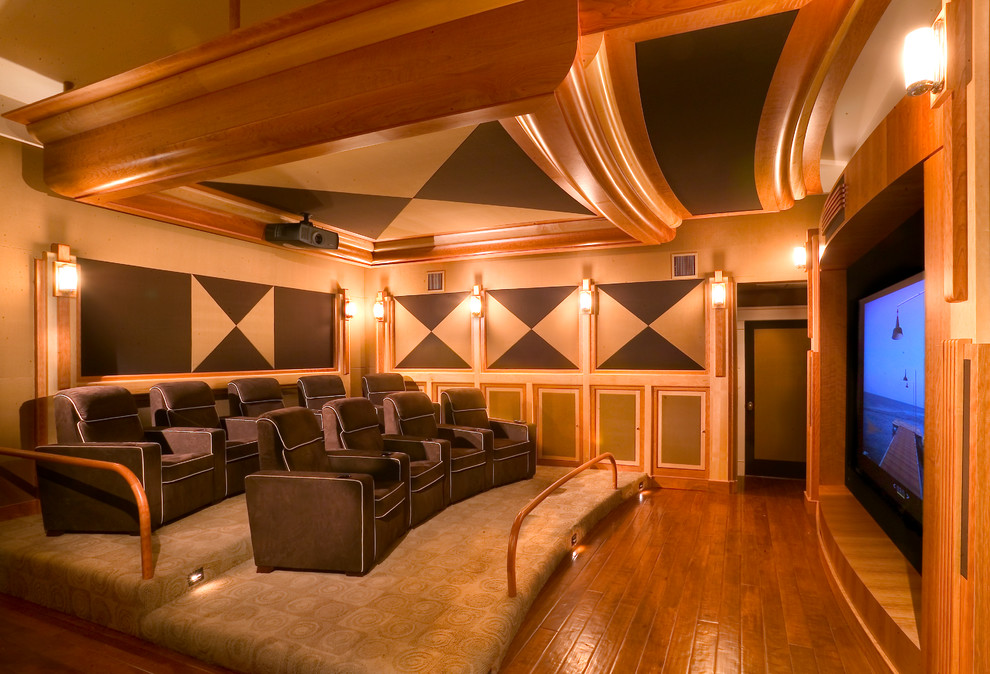 Example of an island style home theater design in Tampa