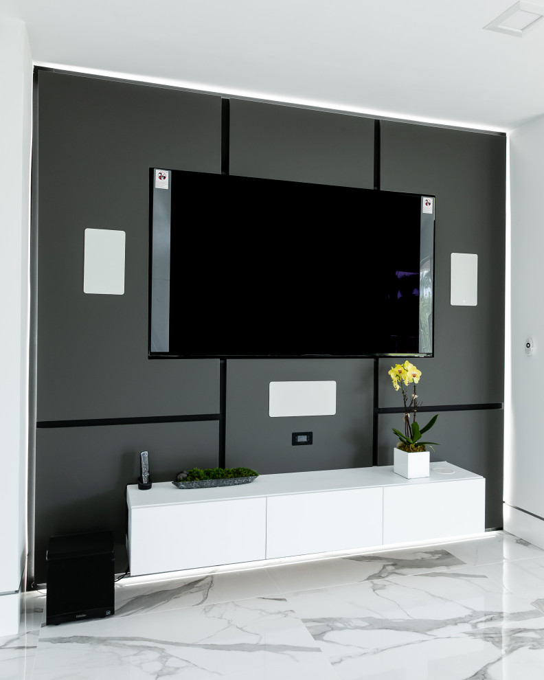 Inspiration for a contemporary home theater remodel in Miami