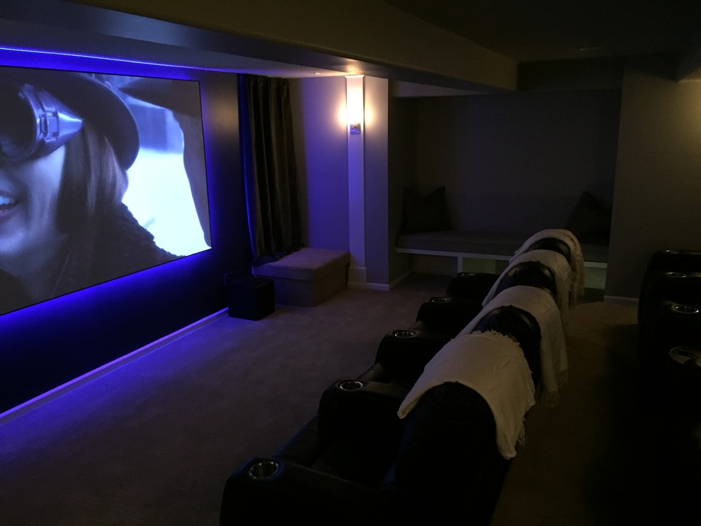 Design ideas for a small modern enclosed home cinema in Kansas City with carpet and a projector screen.
