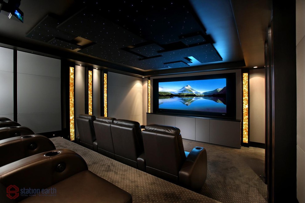 Mid-sized trendy enclosed home theater photo in Toronto with a projector screen