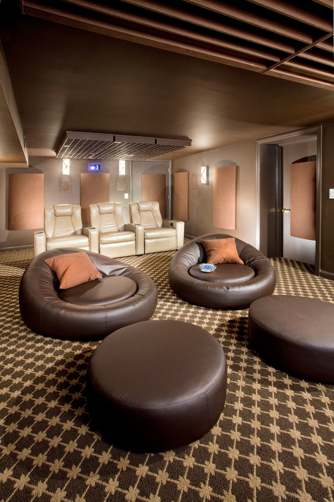 Mid-sized minimalist enclosed carpeted and multicolored floor home theater photo in Newark with brown walls and a wall-mounted tv
