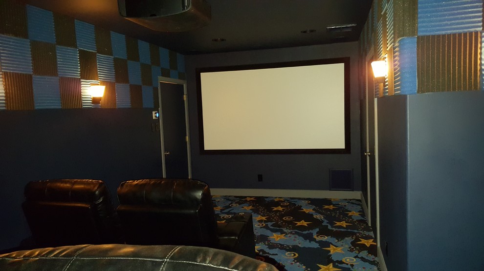 Inspiration for a medium sized modern enclosed home cinema in Houston with blue walls, carpet and a projector screen.