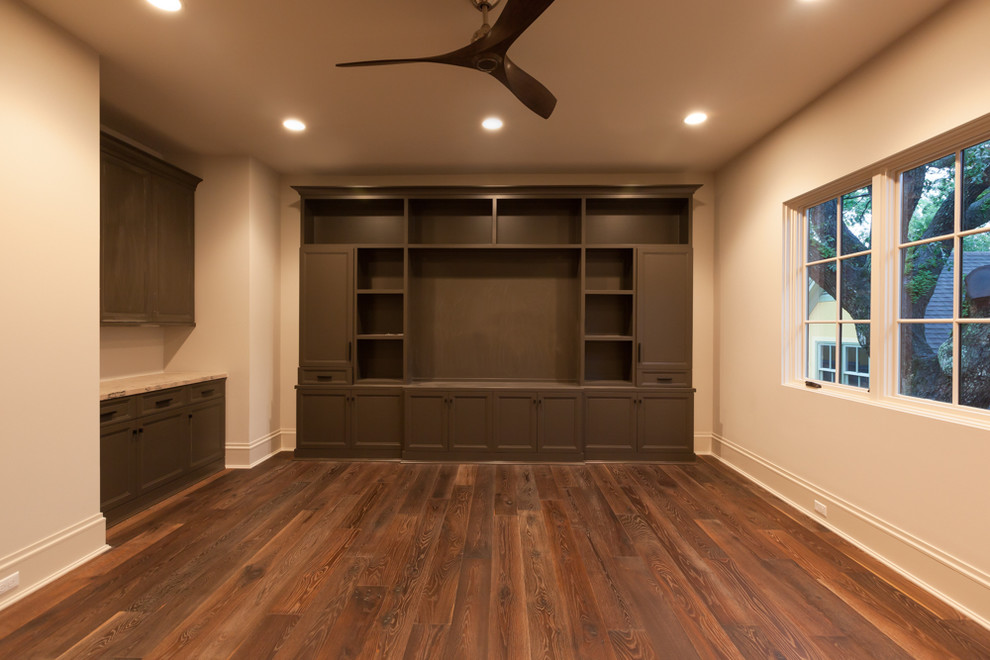 Inspiration for a medium sized classic enclosed home cinema in Houston with beige walls and medium hardwood flooring.