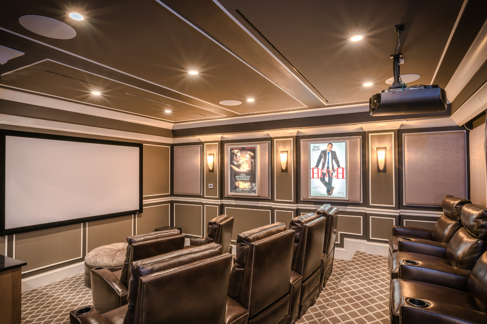 Expansive traditional enclosed home cinema in Miami with brown walls, carpet, a projector screen and multi-coloured floors.