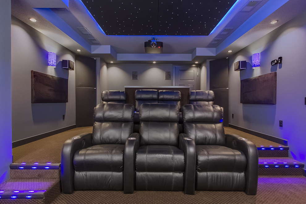 Home theater - mid-sized farmhouse enclosed carpeted home theater idea in Minneapolis with gray walls and a projector screen