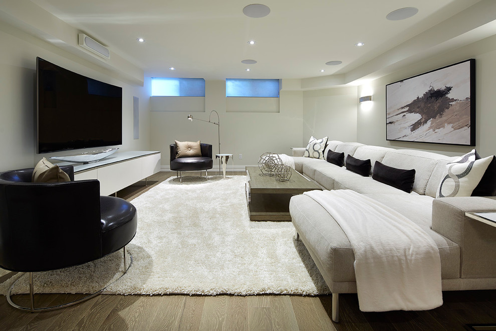 Inspiration for a large classic home cinema in Toronto with white walls and light hardwood flooring.
