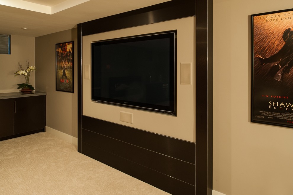 This is an example of a contemporary home cinema in Tampa.