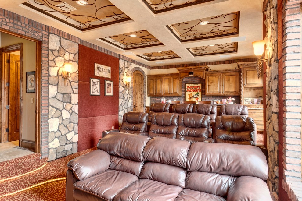 Example of a tuscan carpeted and multicolored floor home theater design in Other