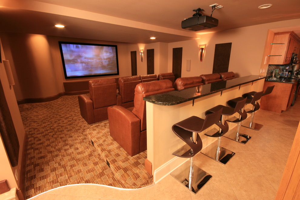 Medium sized modern enclosed home cinema in Chicago with beige walls, carpet, a projector screen and multi-coloured floors.