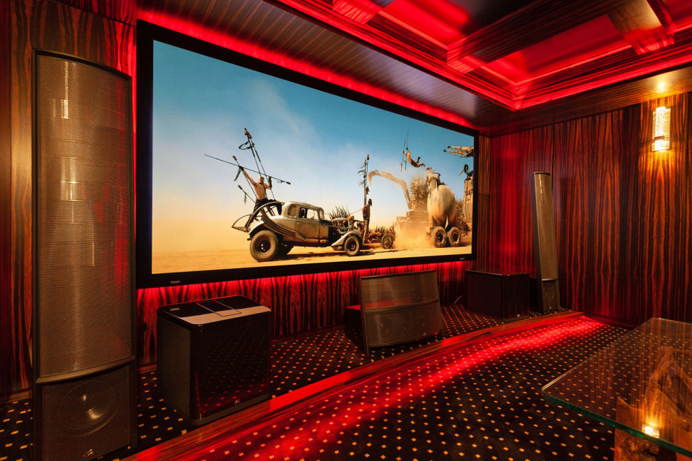 Photo of a large enclosed home cinema in Calgary with brown walls, carpet, a projector screen and black floors.