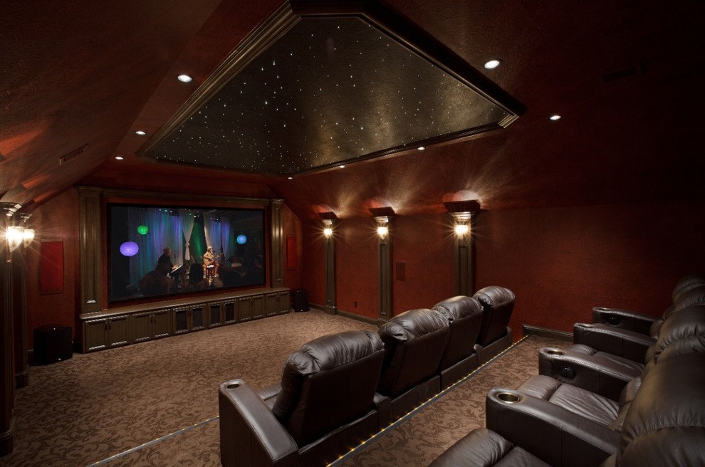 Photo of a traditional home cinema in Houston.