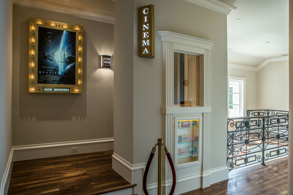 Inspiration for a traditional home cinema in Dallas with medium hardwood flooring.