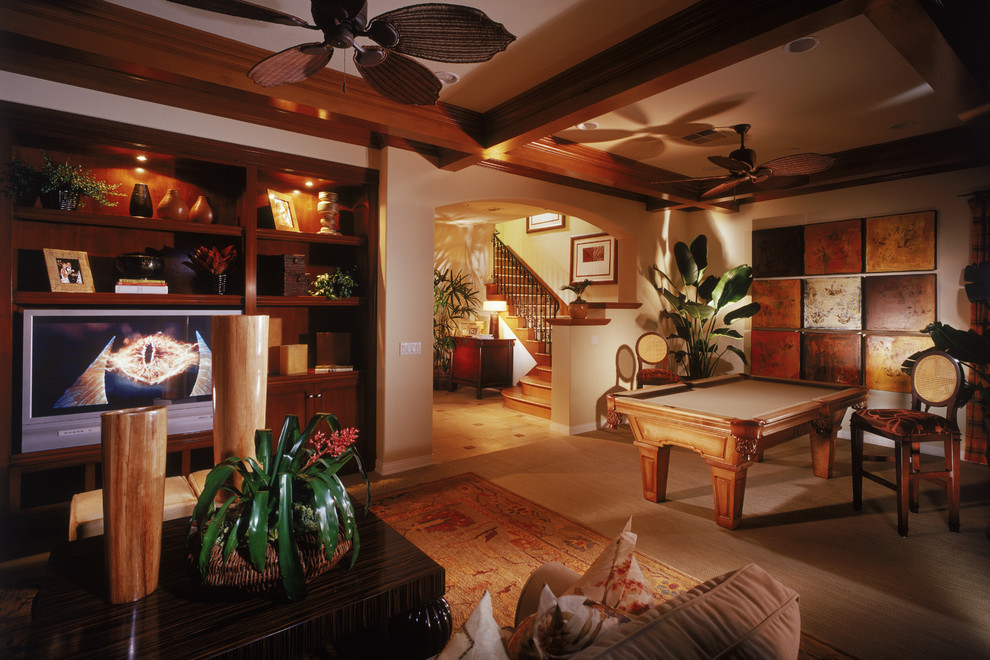 Inspiration for a tropical home theater remodel in Los Angeles