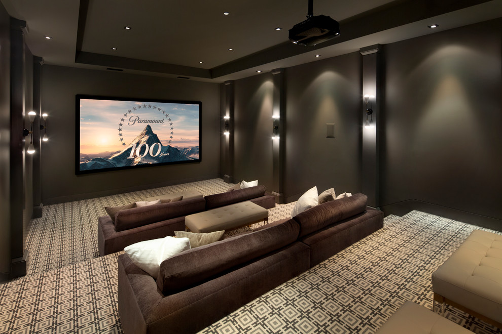 Photo of a modern home cinema in San Francisco with grey walls, carpet, a projector screen and beige floors.