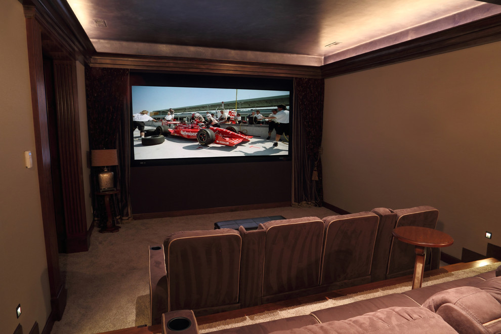 Medium sized mediterranean home cinema in San Francisco with beige walls, carpet and a projector screen.