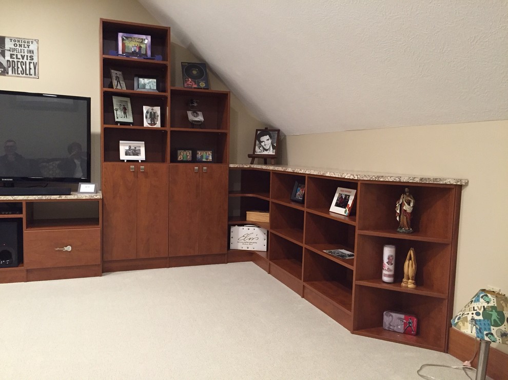 Mid-sized trendy carpeted home theater photo in Cleveland with beige walls
