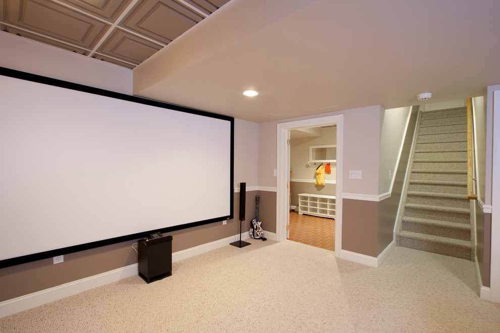 Inspiration for a mid-sized timeless enclosed carpeted home theater remodel in Newark with multicolored walls and a projector screen