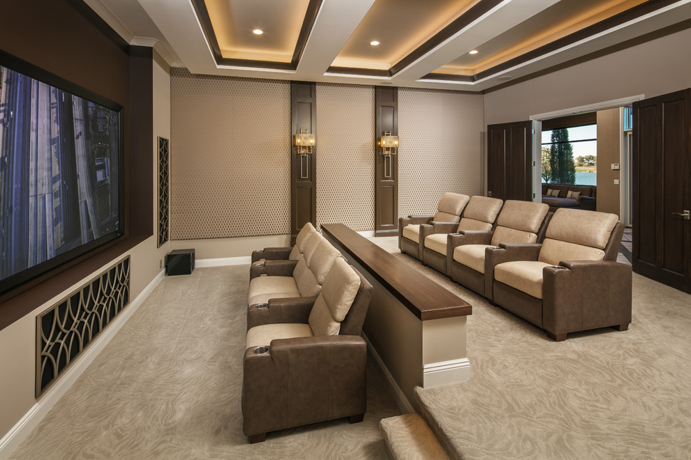 Photo of a large contemporary open plan home cinema in Omaha with beige walls, carpet, a projector screen and beige floors.