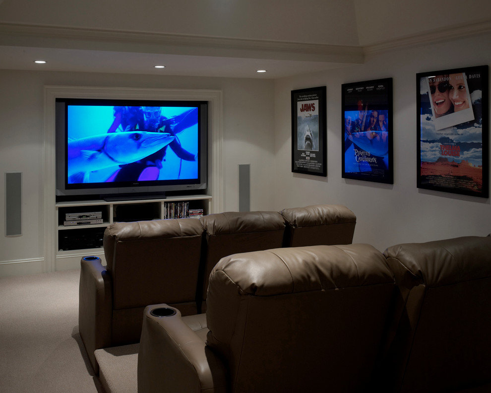 Home theater - mid-sized traditional enclosed carpeted home theater idea in Boston with white walls and a wall-mounted tv