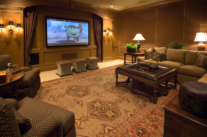 Design ideas for a large traditional enclosed home cinema in Nashville with carpet and a built-in media unit.
