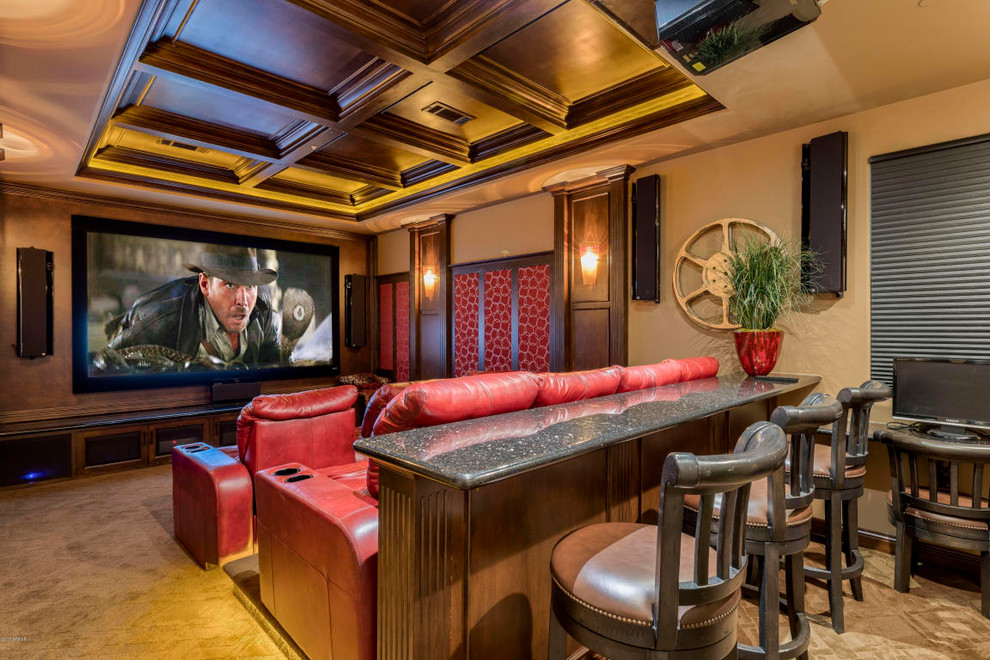 Inspiration for a southwestern beige floor home theater remodel in Phoenix with beige walls and a projector screen