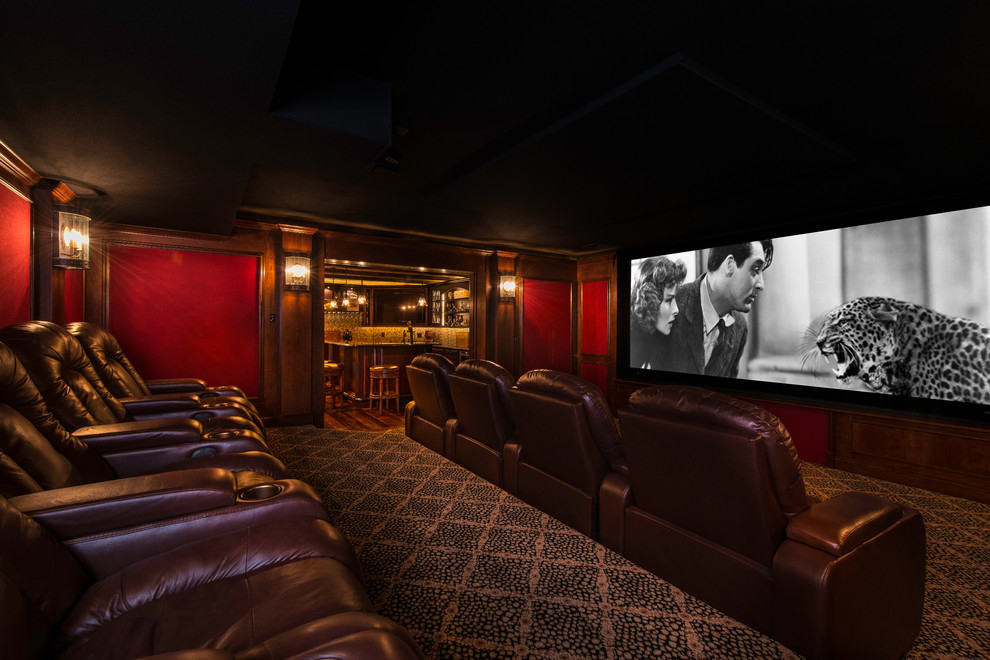 Inspiration for a large timeless enclosed carpeted and multicolored floor home theater remodel in DC Metro with red walls and a projector screen
