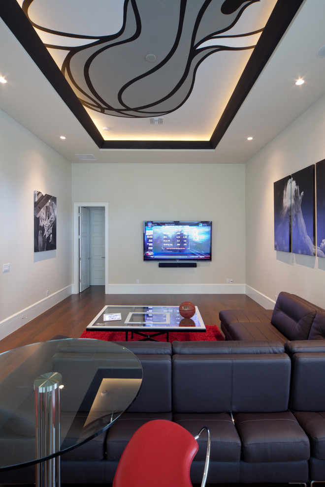 Example of a trendy home theater design in Orlando