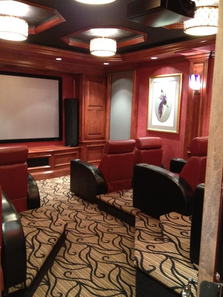 Home theater - small contemporary enclosed carpeted home theater idea in New York with red walls and a projector screen