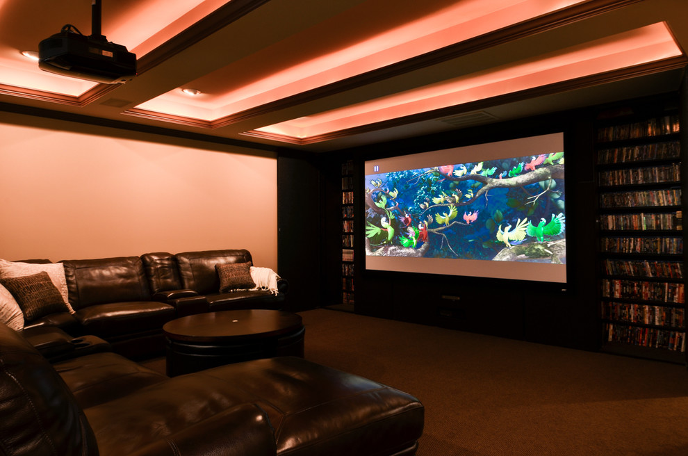 Mid-sized transitional open concept home theater photo in Atlanta with beige walls and a projector screen