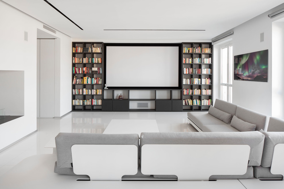 Свежая идея для дизайна: домашний кинотеатр среднего размера в современном стиле с белыми стенами, белым полом и проектором - отличное фото интерьера