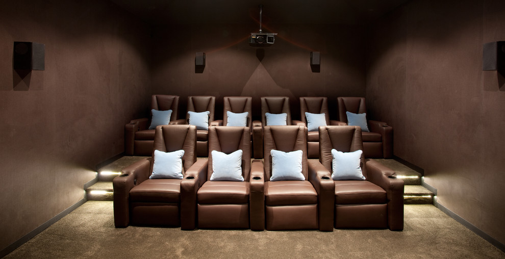 Design ideas for a contemporary home cinema in Melbourne with brown walls and beige floors.