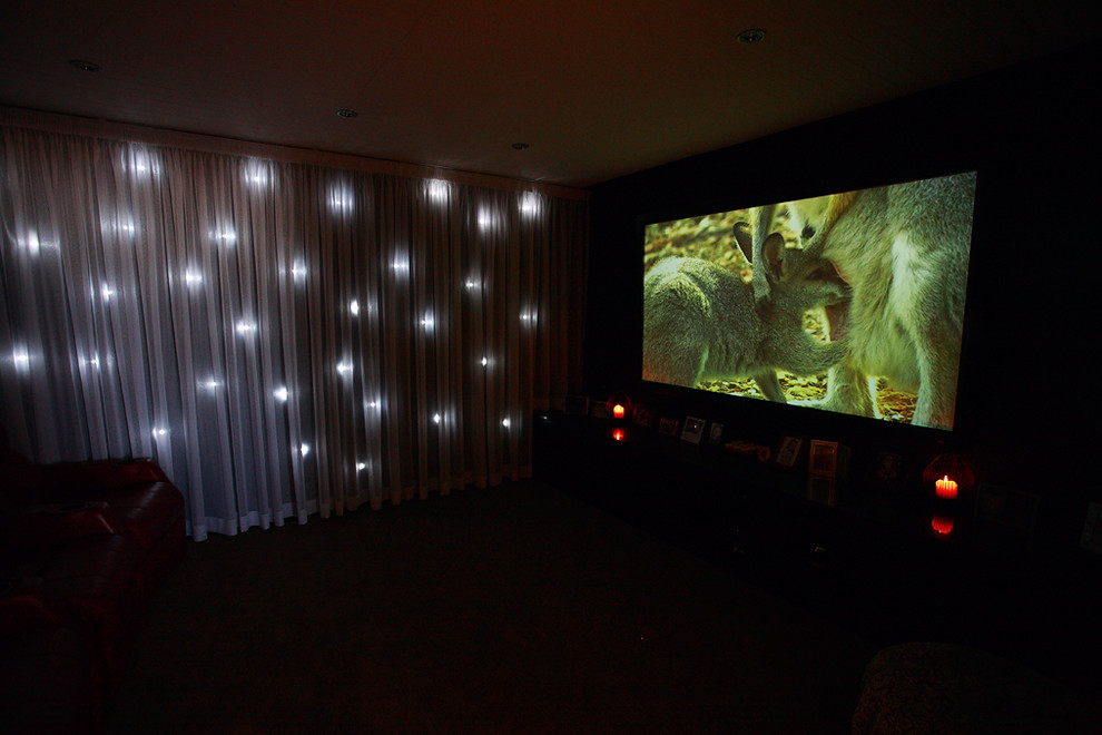 Inspiration for a medium sized modern home cinema in Brisbane.