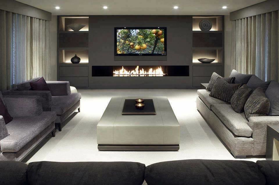 Home theater - large modern home theater idea in Sydney with gray walls and a wall-mounted tv