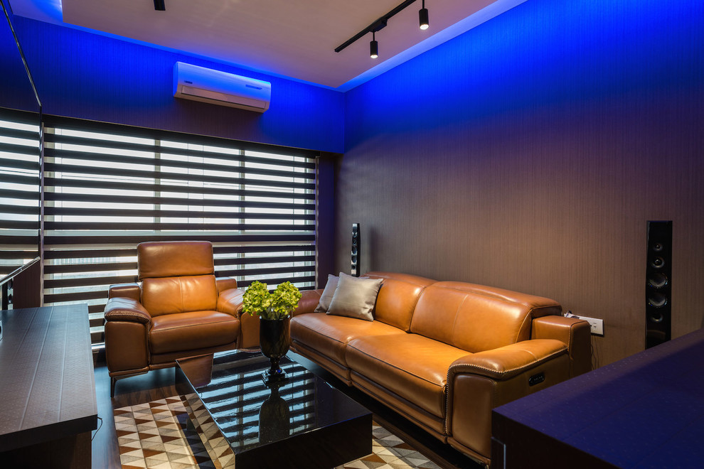 Design ideas for a contemporary enclosed home cinema in Mumbai with brown walls and a wall mounted tv.