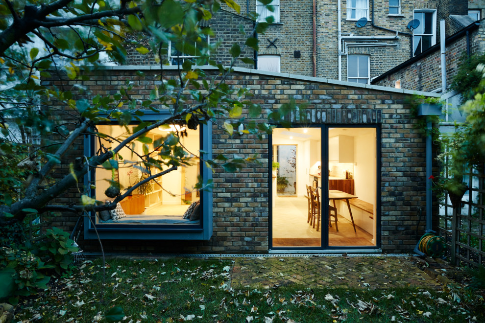 Inspiration for a contemporary one-story exterior home remodel in London