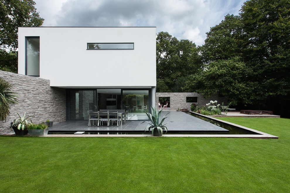 Design ideas for a modern house exterior in Hampshire.