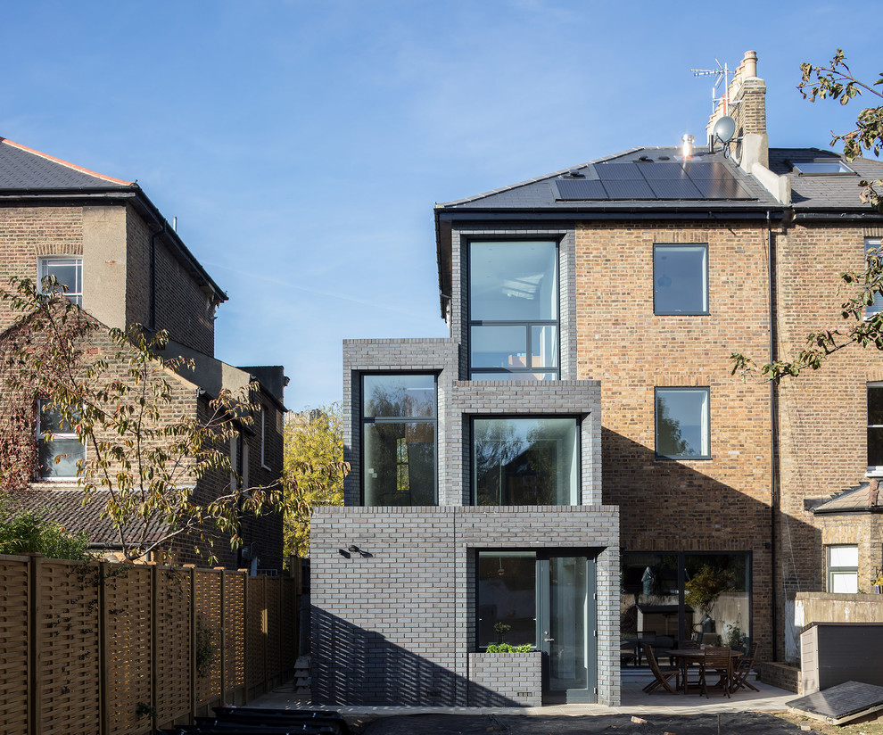 Example of a minimalist exterior home design in London