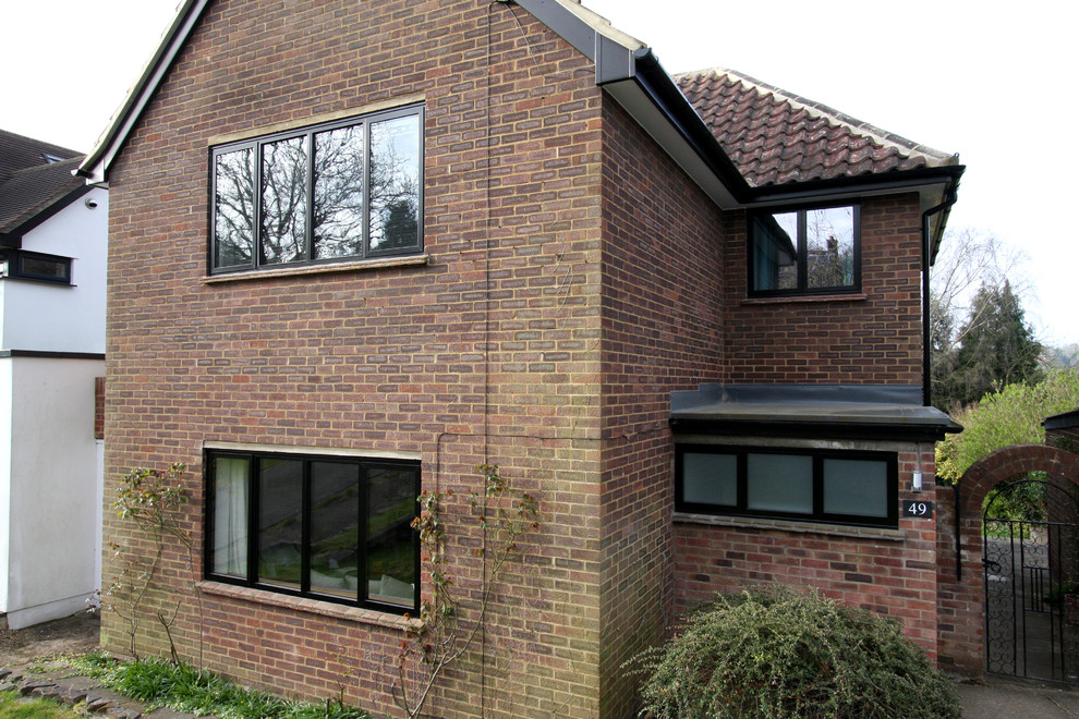 Design ideas for a beige contemporary two floor house exterior in Buckinghamshire.