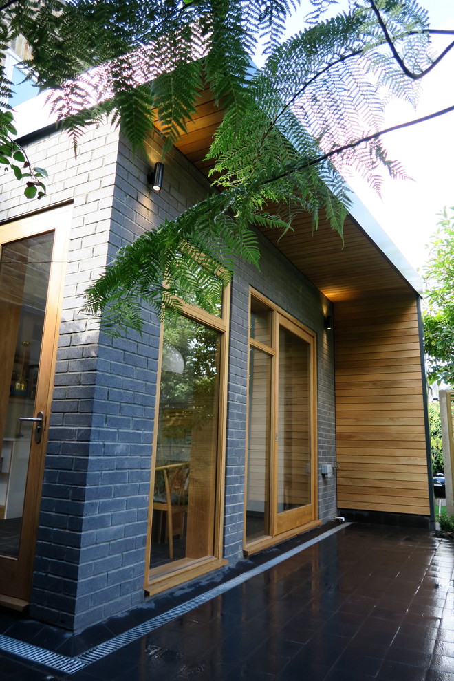 Example of a trendy exterior home design in London