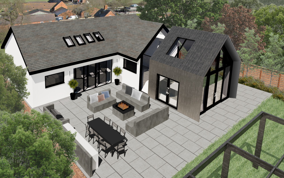 Kleines, Einstöckiges Skandinavisches Haus mit schwarzer Fassadenfarbe und Satteldach in Sussex