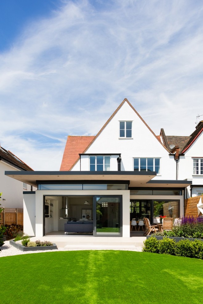 Contemporary house exterior in London with a pitched roof.