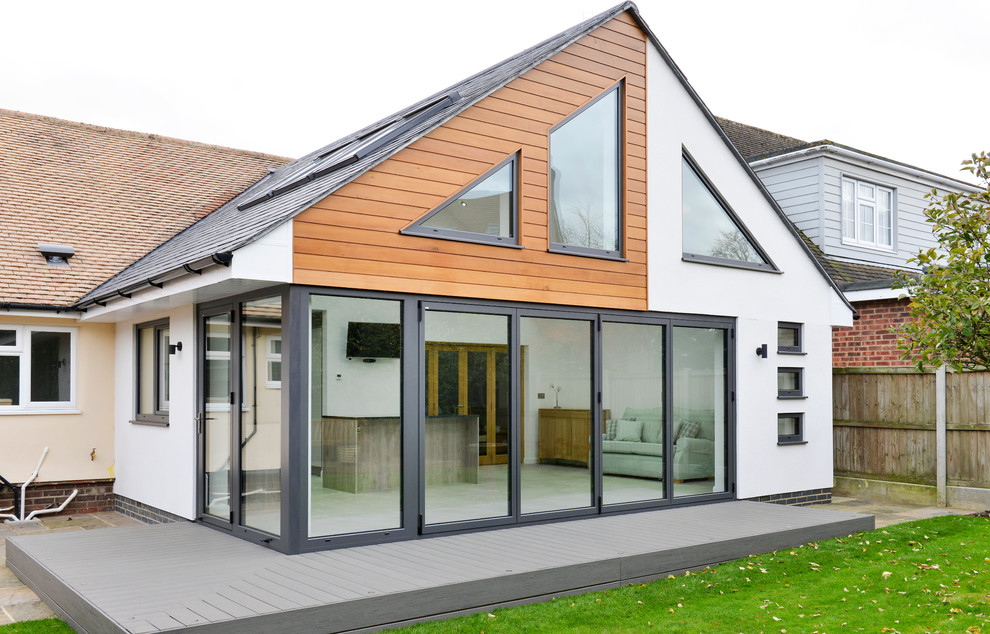 Example of a trendy one-story exterior home design in Dorset