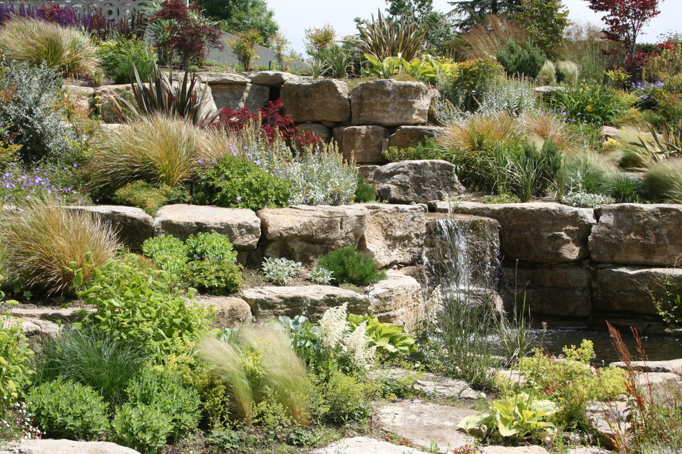 Photo of a large traditional landscaping in Other.