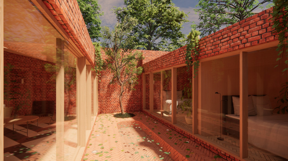 Exempel på ett litet modernt rött hus, med allt i ett plan, tegel, platt tak och levande tak
