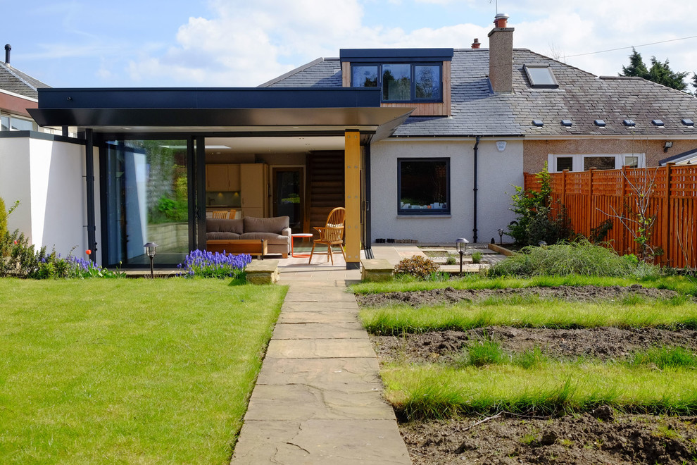 White contemporary bungalow render extension in Edinburgh.