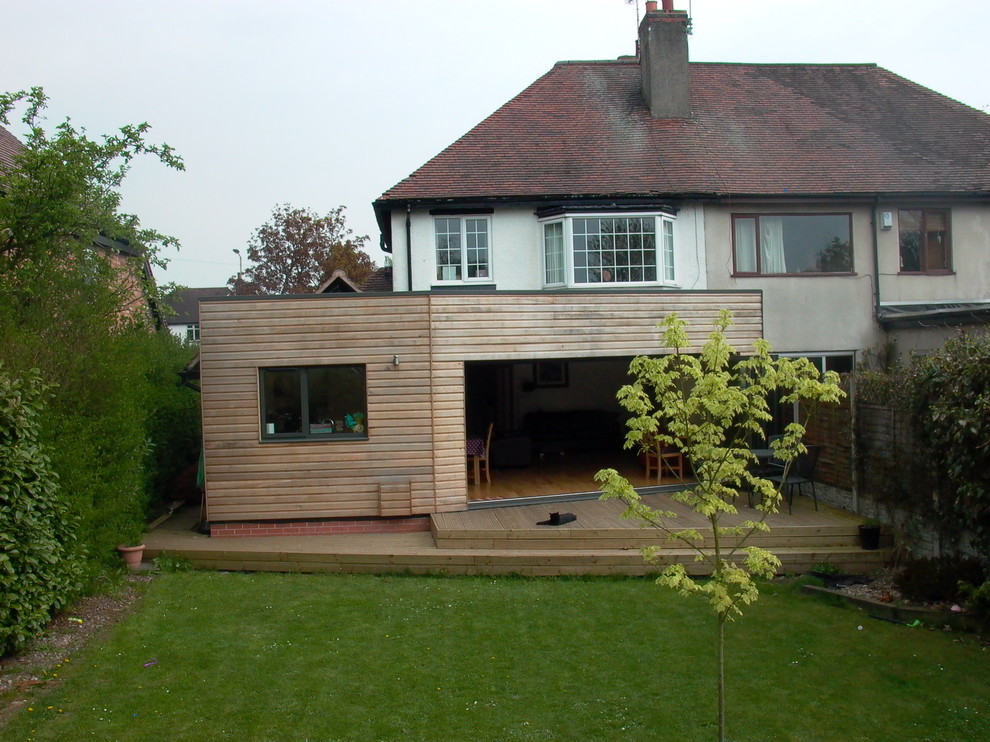 Design ideas for a contemporary house exterior in West Midlands.