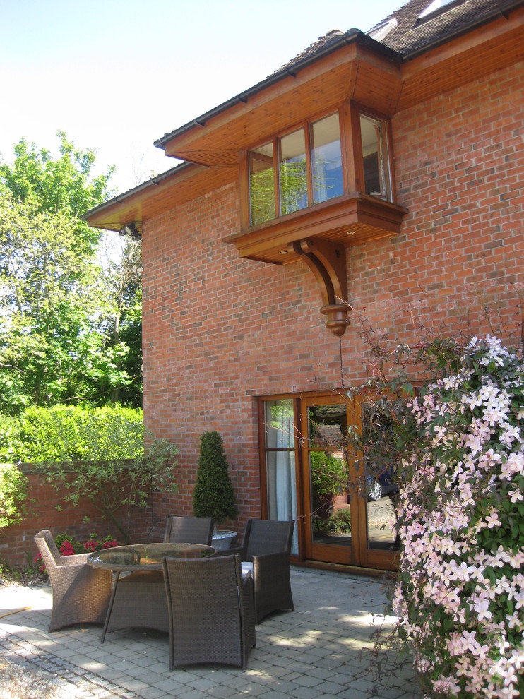 Edwin lutyens styled home with heavy overhanging eaves Traditional Exterior London by