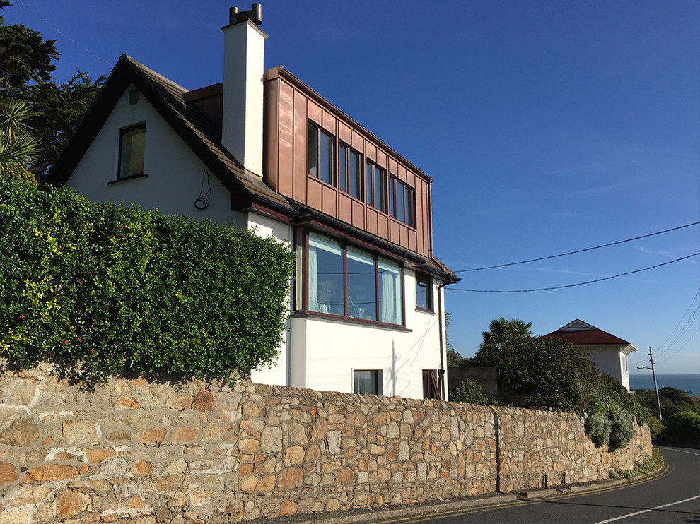 This is an example of a medium sized contemporary house exterior in Dublin.
